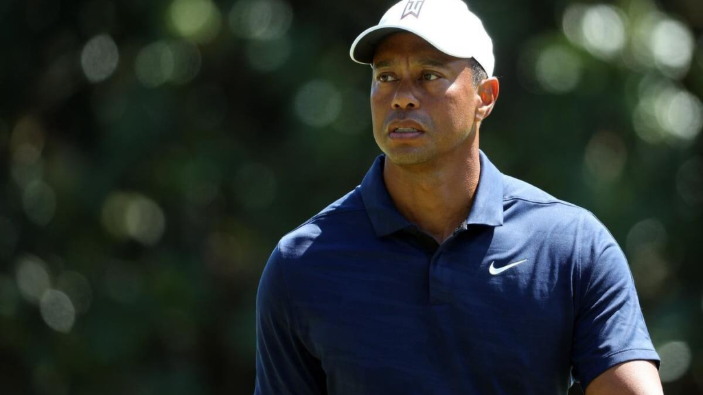 Tiger Woods, the golfing icon, pictured on the course, symbolizes the financial success and career achievements discussed in the blog about his net worth in 2024.