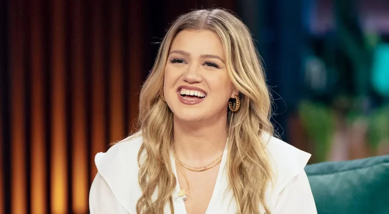 Kelly Clarkson, the multi-talented star, was photographed during a live performance, capturing the essence of her financial success and career achievements discussed in the blog about her net worth, salary and income.