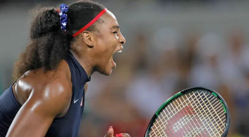 Serena Williams, the tennis sensation, is pictured on the court, embodying the spirit of a champion and the financial success discussed in the blog about her net worth.